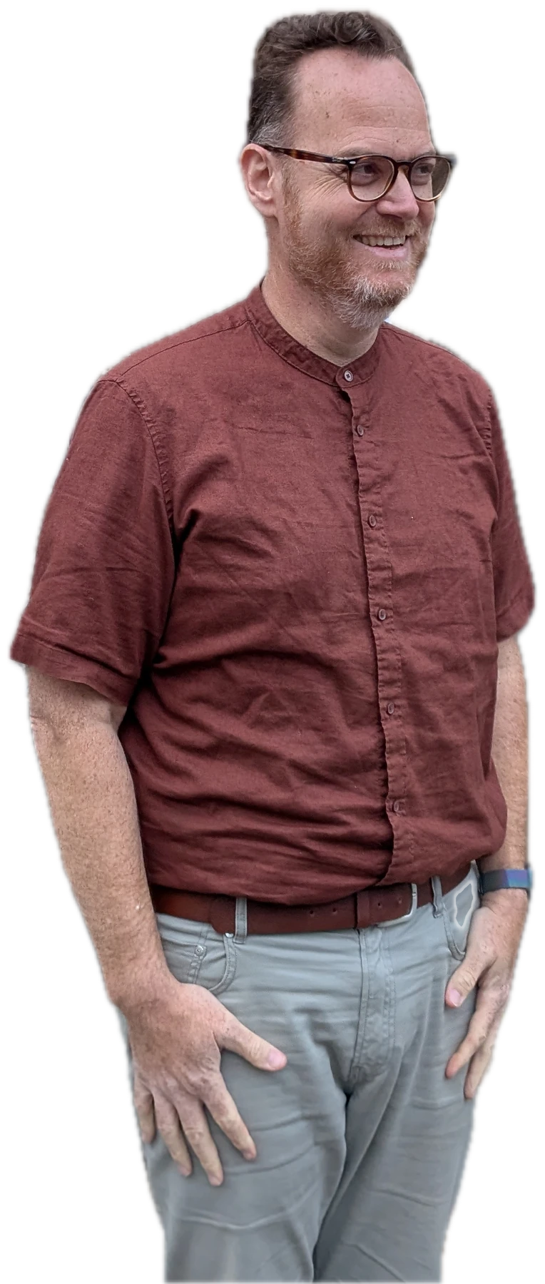 Eyal smiling in a red shirt