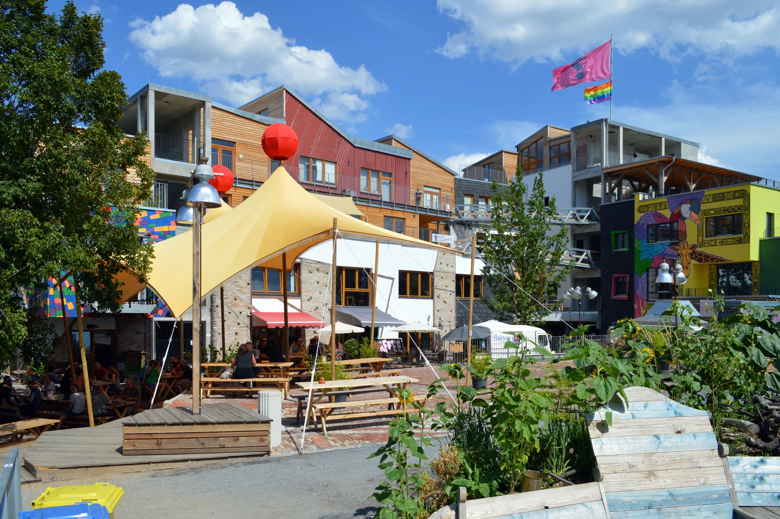 The colorful courtyard and outdoor seating at Holzmarkt 25, Berlin